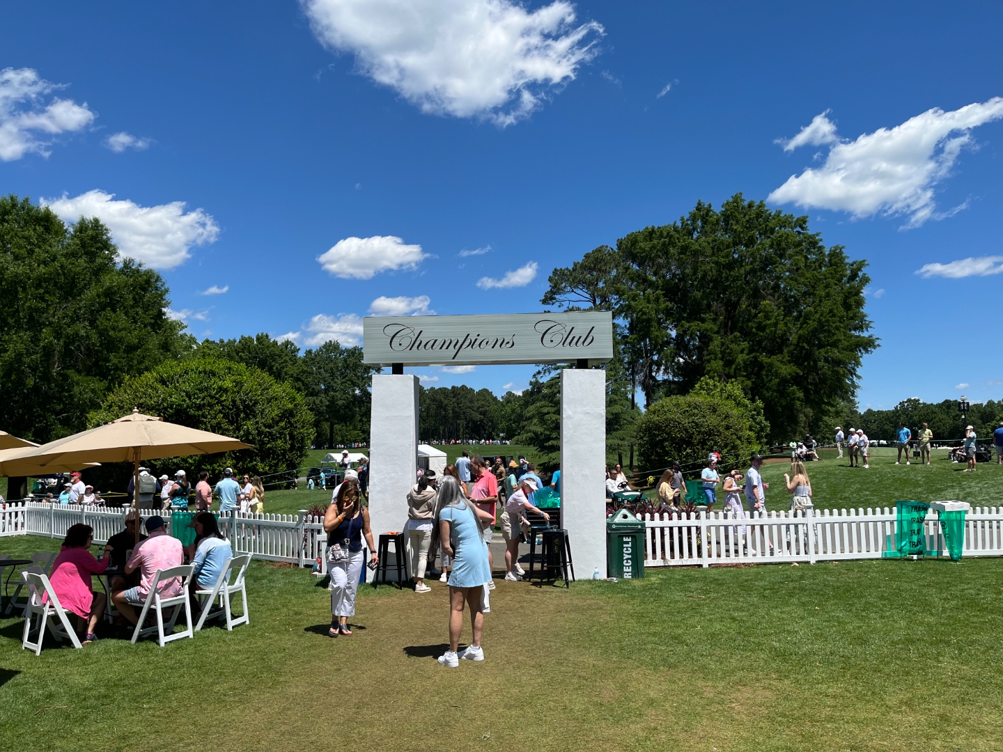 White picket fencing lining a golf tournament hospitality entrance at Champions Club