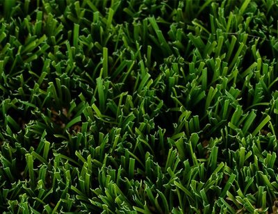 Close-up of green artificial turf grass blades